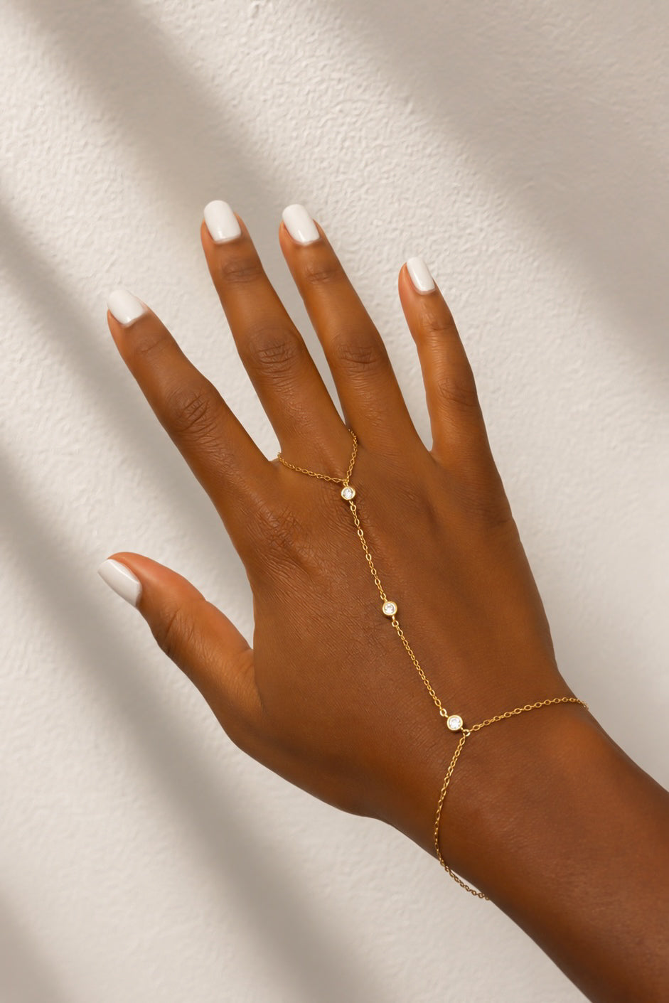 TIERED CZ HAND CHAIN - GOLD